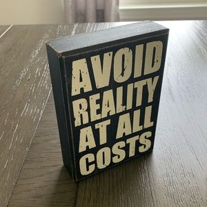 Avoid Reality At All Costs wall art